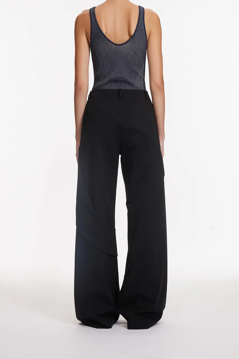 HIGH-WAISTED STREAMLINED FLARED TROUSERS