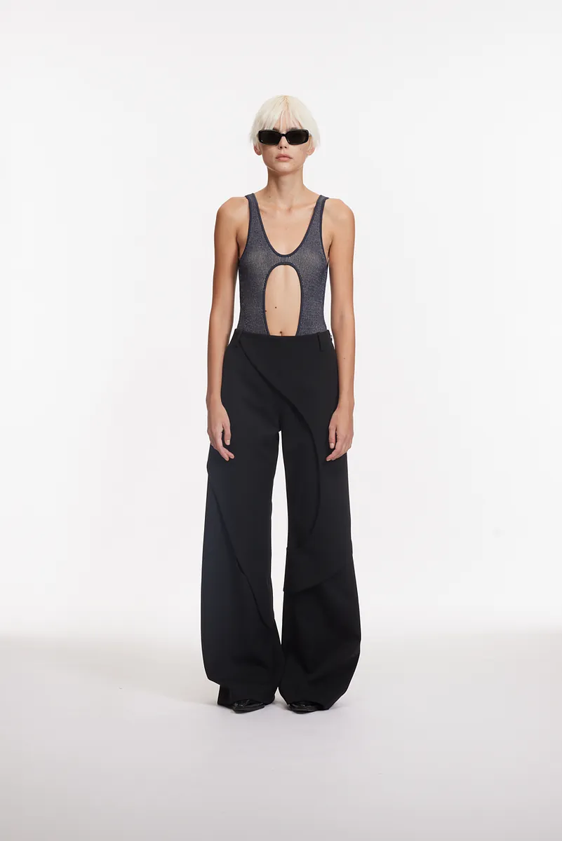 HIGH-WAISTED STREAMLINED FLARED TROUSERS